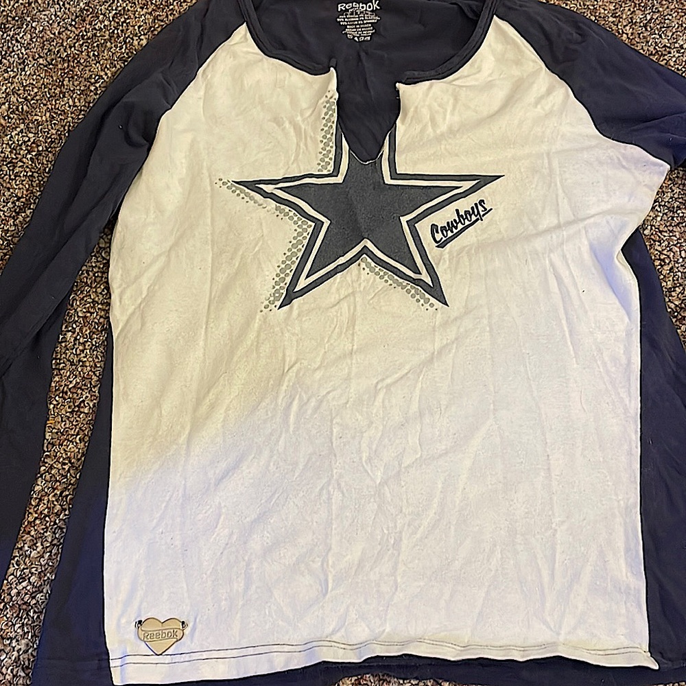 I am selling this cowboys woman’s shirt
